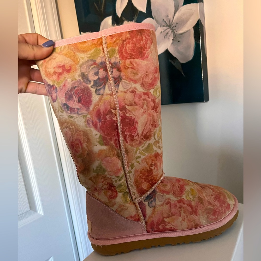 Pink floral UGG boots in women’s size 7.